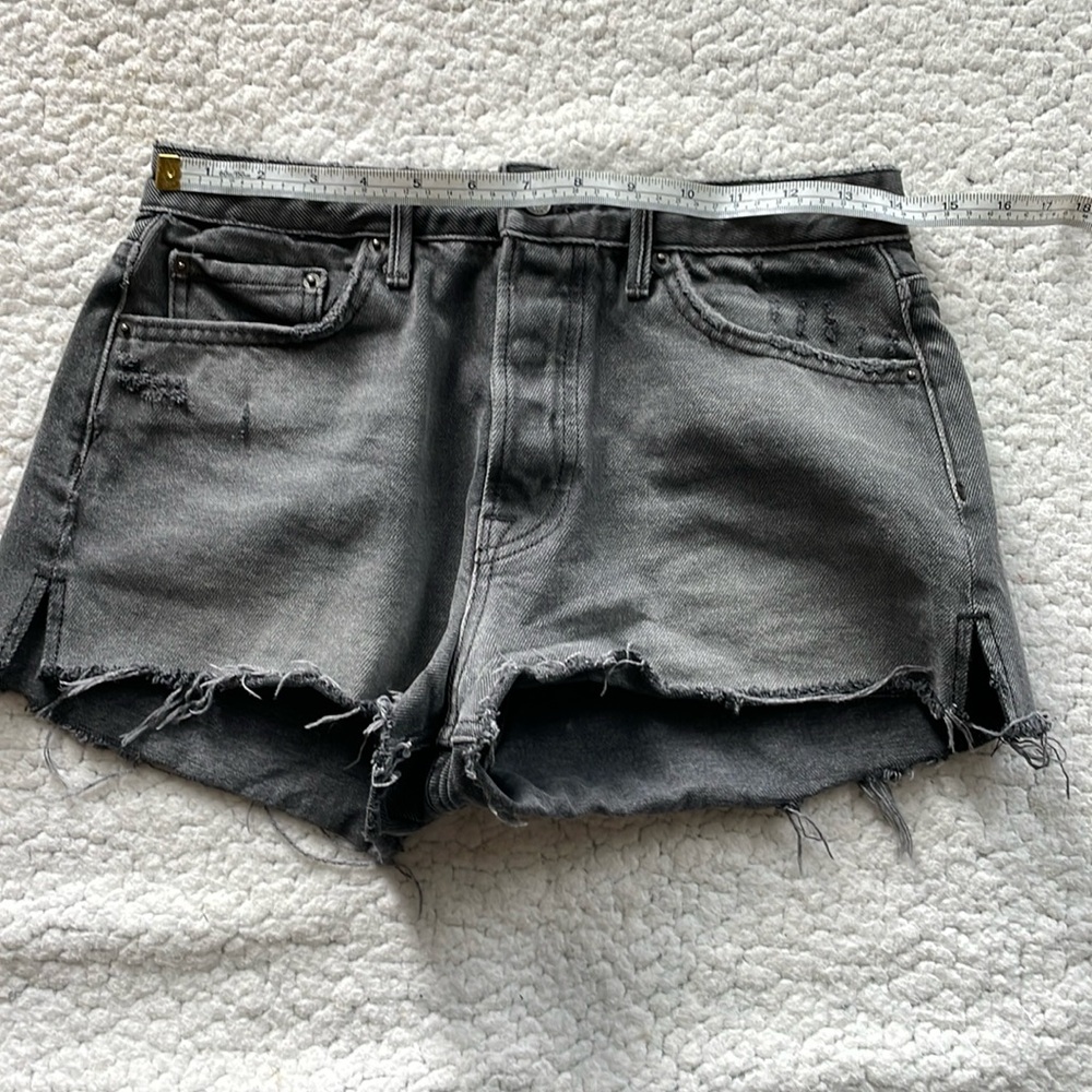 Grlfrnd grey jeans, says 28 but fit like 26.